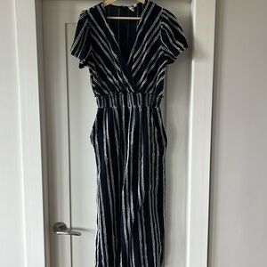 Anthropologie jumpsuit with pockets and back zipper